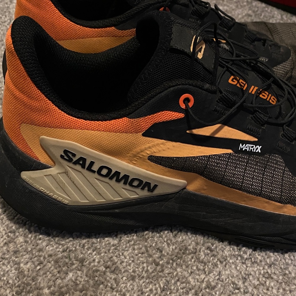 Salomon Matrix genesis Black and Orange trail Shoes.